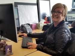 Judi Baker at the Service Desk in our Seattle headquarters office.
